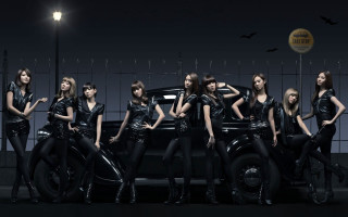 Women leather outfits car fenced - a car in front free wallpaper