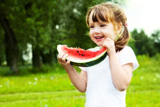 Little girl eating watermelon field - little free wallpaper for desktop