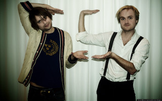 Two men hands in air - their hands in free wallpaper