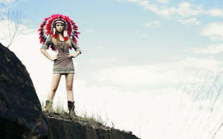 Woman headdress cliff grass rocks - a cliff free wallpaper