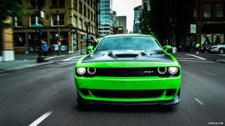 Green car city street traffic - a city street next free wallpaper