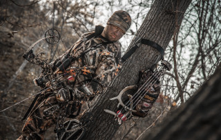 Man camouflage bow bowcase forest - tree free wallpaper