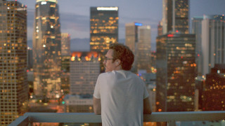 Man balcony city night skyscrapers - the background and a city skyline free wallpaper