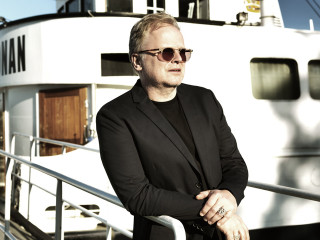 Man suit sunglasses boat portrait - his arm free wallpaper