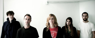 Group people standing room white - andrew boog faithfull free wallpaper