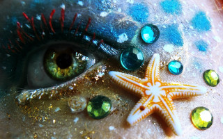 Starfish green eyes jewels face - a starfish free wallpaper