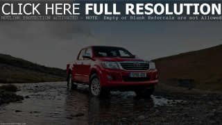 Red truck driving river hill - a sky background and a caption free wallpaper