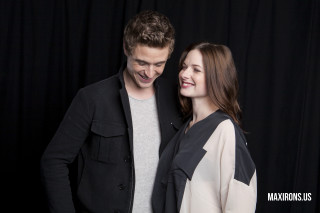 Smiling man woman standing together - each others eye free wallpaper