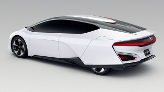 White car studio gray background 2 - a studio free wallpaper