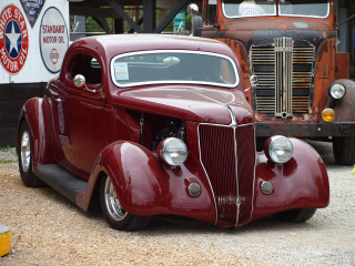 Red car truck parking lot - other car behind free wallpaper