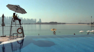 Person sitting ladder pool umbrella - an umbrella over free wallpaper