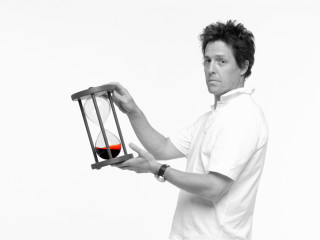 Man hourglass red liquid white - brad holland free wallpaper