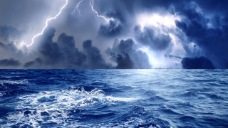 Storm ocean boat clouds lightning - a storm free wallpaper