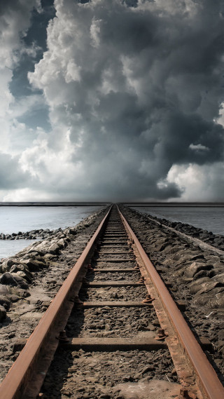Train track cloudy sky water - free sky wallpaper
