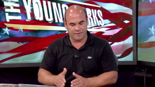 Man black shirt sitting talking - someone free wallpaper