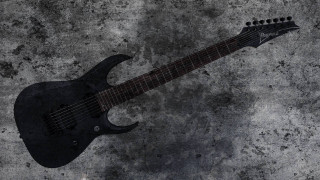 Black guitar gray surface realistic - eric peterson free wallpaper