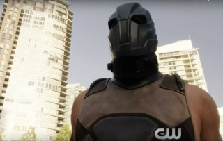 Man helmet tall building city - front free wallpaper