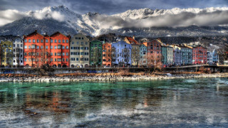 River city mountains bridge buildings - the background and a bridge in the foreground free wallpaper