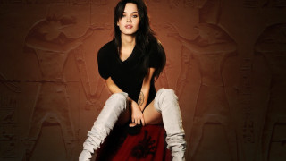 Woman sitting chair legs crossed 20 - egyptian art free wallpaper