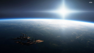 Space station earth sun shining 3 - a space station in the middle of the earth free wallpaper