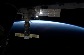 Space station satellite dark sky - a space station free wallpaper