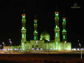 Large building lights nighttime green - a green dome free wallpaper
