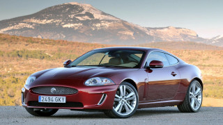 Red sports car mountain range - a mountain in the background and a sky background free wallpaper