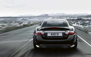 Black car mountain snow road - xf iq4 free wallpaper for desktop