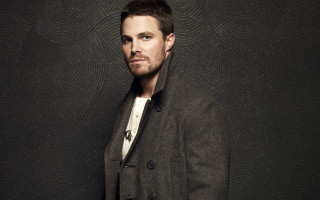 Man coat standing black wall - a black wall free wallpaper