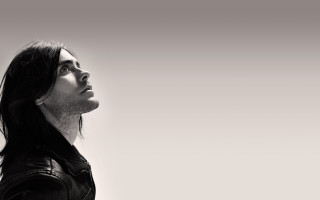 Man longhair leatherjacket lookingup blackwhite - divinity free wallpaper