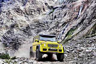 Yellow truck rocky road mountain - a mountain side free wallpaper