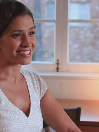 Woman white dress sitting table 3 - free light wallpaper for mobile