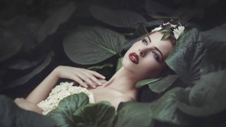 Woman flower hair lying leaves - artur tarnowski free wallpaper