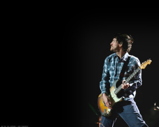 Man playing guitar concert microphone 2 - dan smith free wallpaper