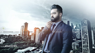 Man suit tie city skyline 2 - movie still frame free wallpaper for desktop