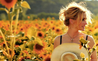 Woman field sunflowers hat sunflower - movie still frame free wallpaper