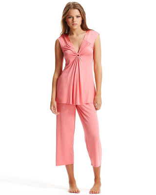 Woman pink top pants standing - christian hilfgott brand free wallpaper for mobile