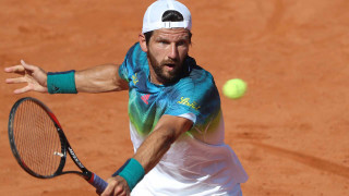 Man swinging tennis racket ball 2 - a tennis ball free wallpaper