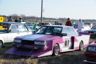 Cars parked field people standing - the car free wallpaper