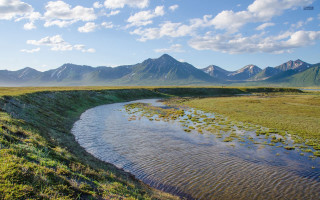 River green field mountains clouds - a lush green field next free wallpaper
