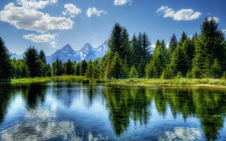 Lake trees mountains blue sky 22 - cloud and sun free wallpaper