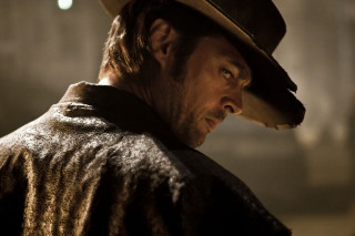 Man cowboy hat serious look - the distance free wallpaper