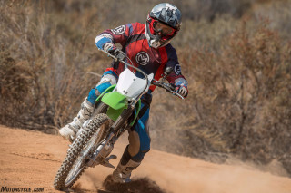 Dirt bike rider bushes outdoors - round free wallpaper