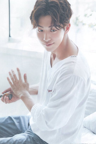 Man sitting bed holding cigarette - handsome free wallpaper for mobile