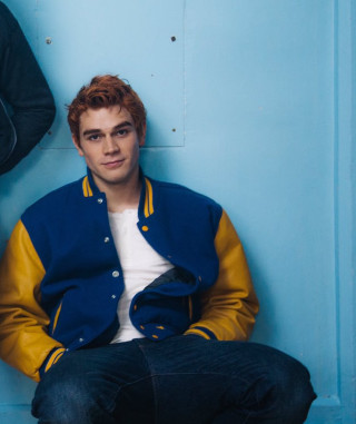 Man sitting blue wall jacket - free vintage wallpaper for mobile