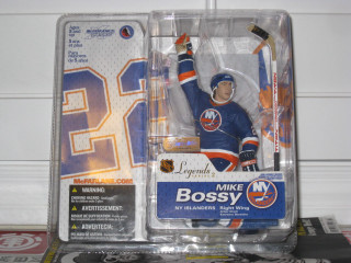 Hockey player bronze toy sculpture - a hockey stick free wallpaper