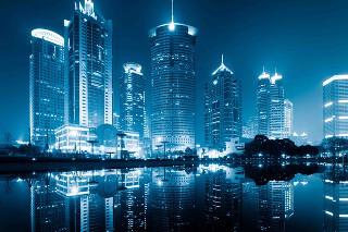 City skyline lake blue sky 2 - a lake in the foreground free wallpaper