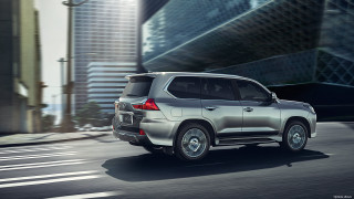 Silver suv city street tall - a silver suv free wallpaper