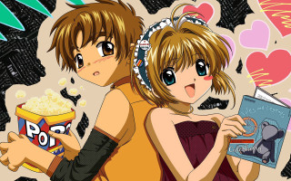 Anime couple holding popcorn book - a couple of anime characters holding free wallpaper
