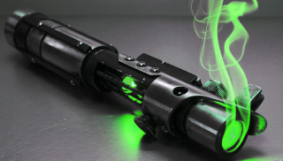 Green laser light gun table - hand free wallpaper for desktop